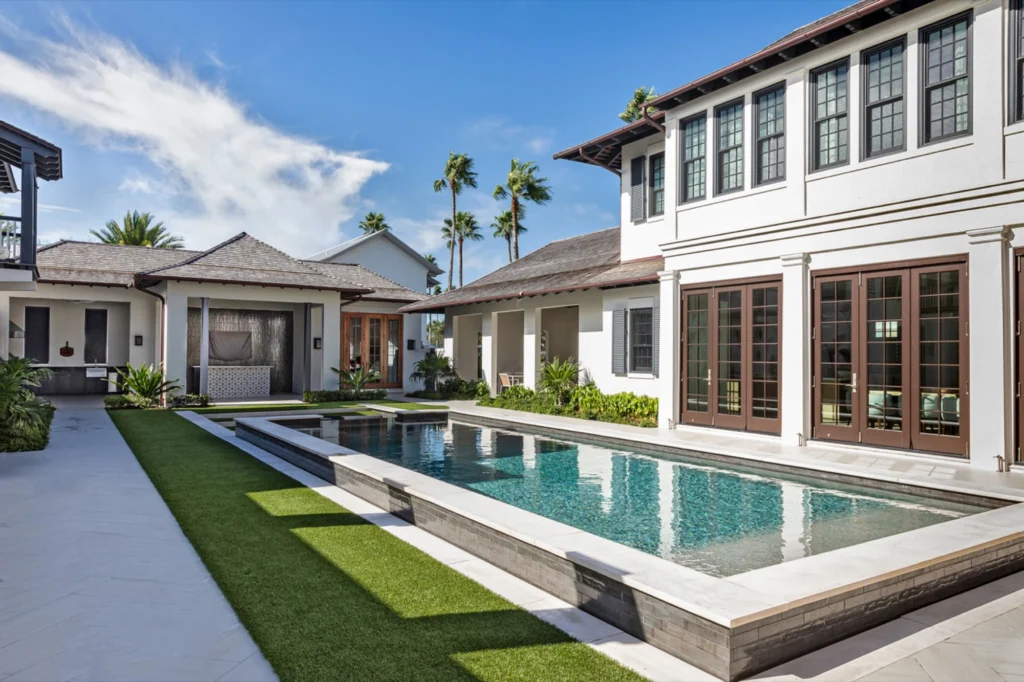 Exterior view of the pool area for a residential remodel in Windsor by Dingwall Architecture.